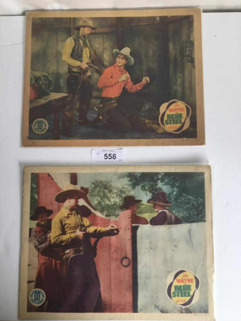 John Wayne. Blue Steel. Lot of (7) Lobby Cards.: Lot includes (4) Original Monogram Pictures 1934 Cards and (3) Lone Star Western Re-Release Cards. The Original Cards are Very Nice, the Three Re-Release Cards are rough.