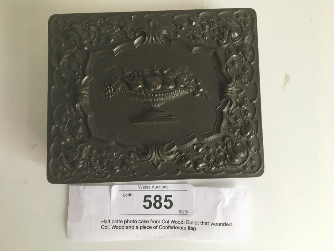 Colonel Wood Artifacts.: 1/2 Plate Union Case containing the Bullet that wounded Col. Wood and a piece of a Confederate Flag.