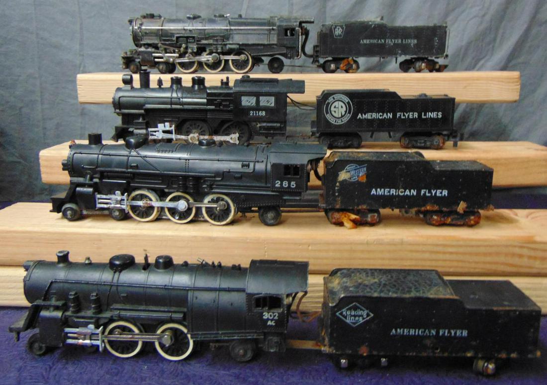 4 American Flyer Steam Locomotives, TLC: S Ga. Includes a 312 PRR Pacific; 285 AF Pacific; 21168 Casey Jones; 302AC Atlantic. All were in a moist environment and chassis and tender frame & 295 tender shell show some corrosion. Examine closel