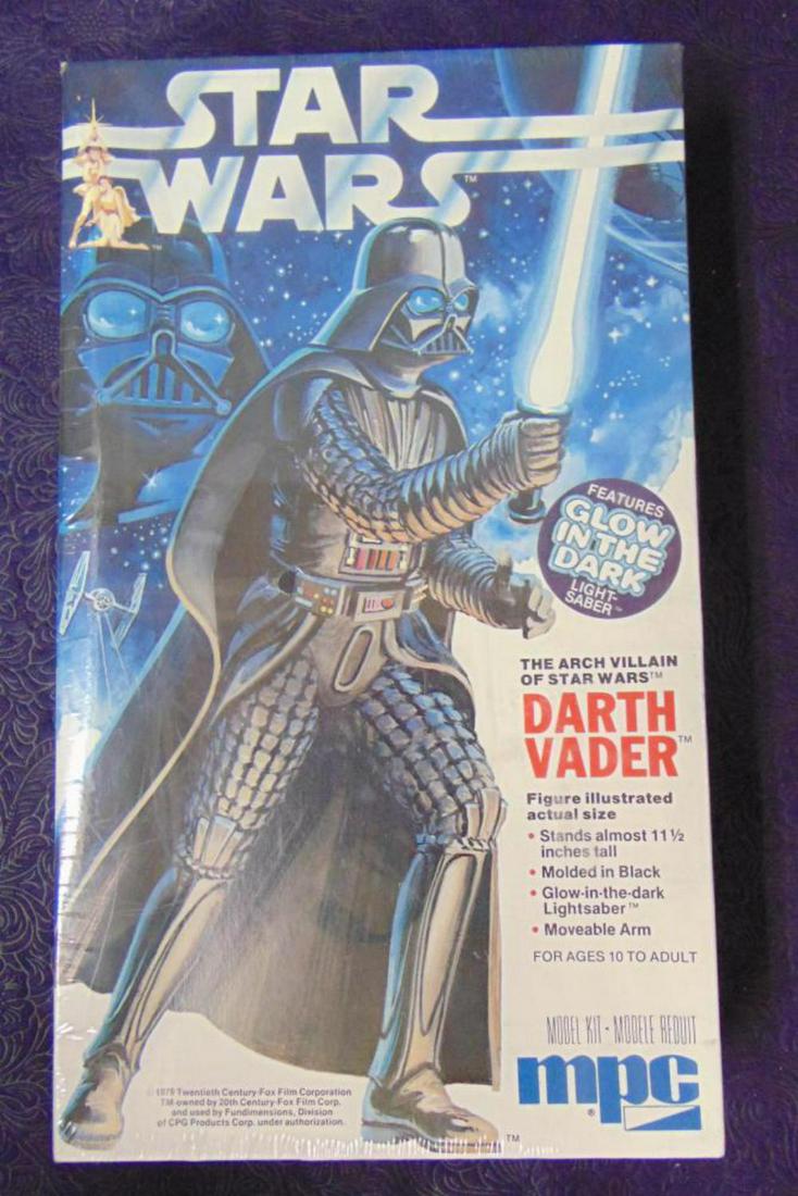 1979 Star Wars Darth Vader MPC Model Kit, Sealed: Vintage and Original, Factory Sealed, Star Wars "Darth Vader" Model Kit by MPC, 1979, Kit #1-1916. Approx. 11-1/2" tall when assembled. Features glow in the dark light saber and moveable arm. See imag