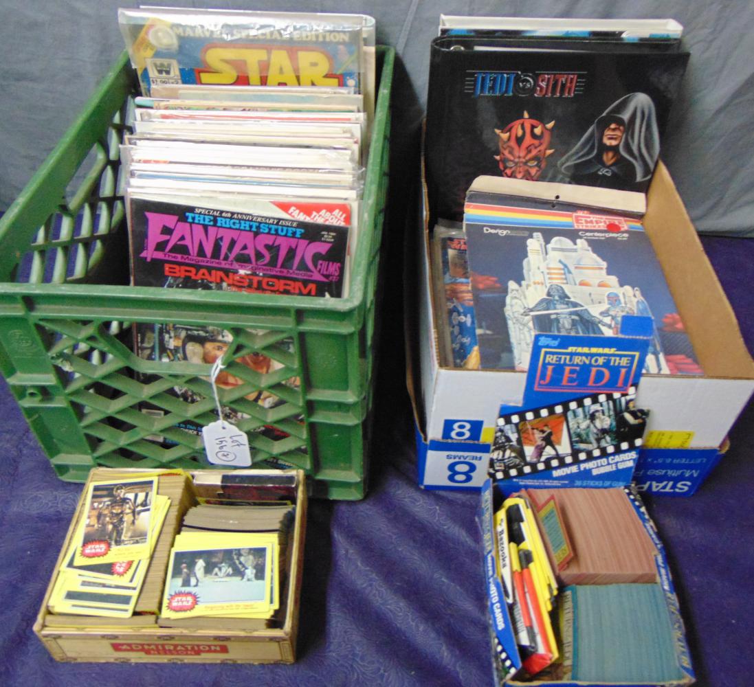 Assorted Star Wars Ephemera Lot, Books, Magazines: Lot consists of 2 boxes featuring assorted Stars Wars ephemera. Includes various books, ROTJ portfolio by Ralph McQuarrie (worn covers), assorted trading cards, wrapping paper, ESB party centerpiece, 
