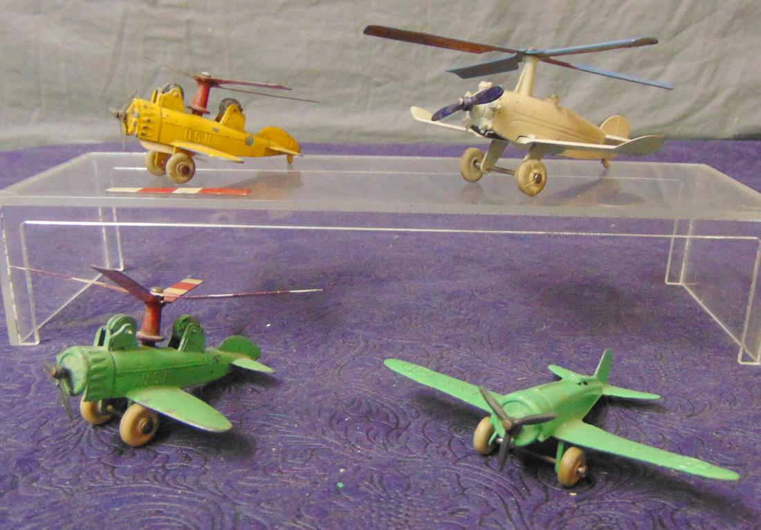4 TootsieToy Prewar Airplanes: Includes large Auto-Gyro; 2 smaller Line-Driven Auto-Gyros, yellow has prop issues; Mono plane. Rest show light playwear.