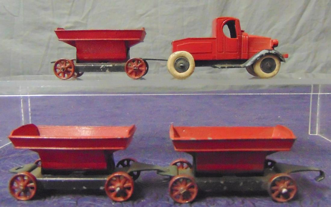Nice TootsieToy Prewar Hopper Train: Includes a hubbed wheel tractor with 3 metal wheeled hoppers. They show light to moderate playwear. Nice!