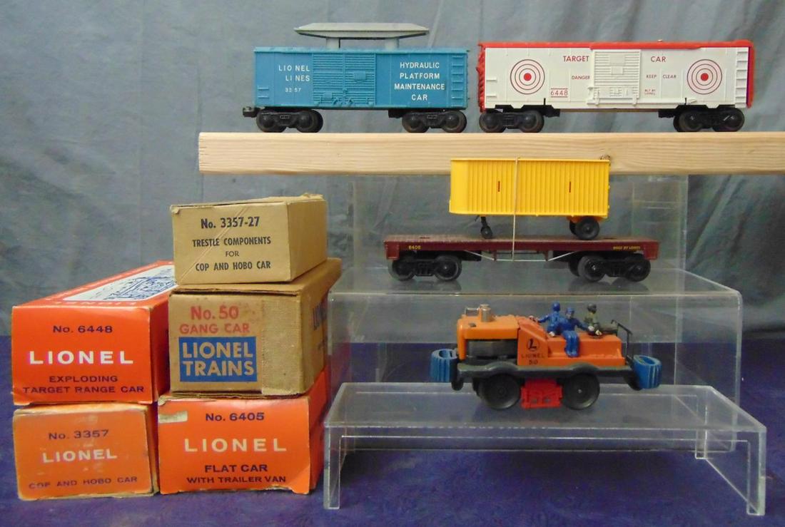 4 Late Lionel Freight Cars: Includes a 50 Gang Car, complete, late ob; 6405 flat with yellow van; 3357 Cop’n Hobo Car, scarce teal blue example, but has only a few accessories, no men, -27 box & instructions. Set box is worn, 