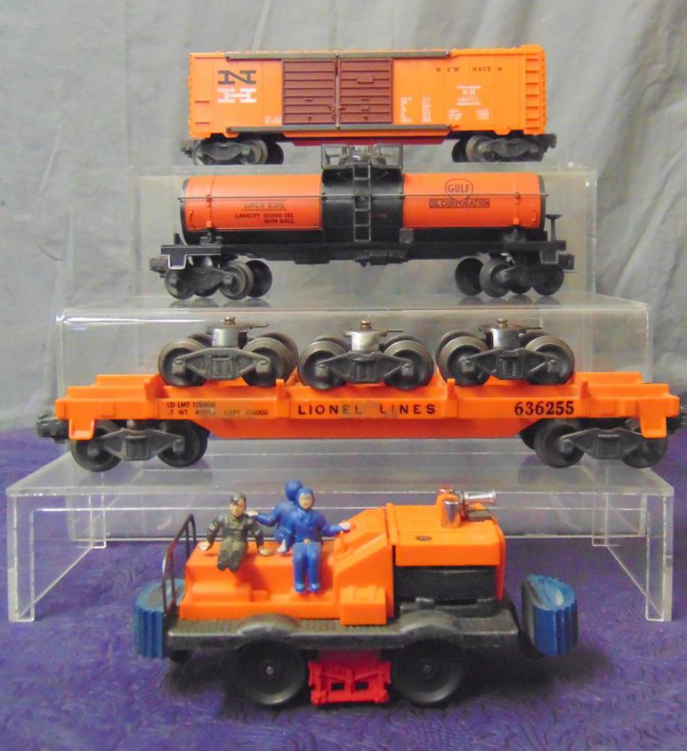4 Lionel Freight Cars: Includes a 6315 Gulf Chemical Tank; 50 Gang Car; 6468-25 NH Boxcar, tougher brown door variation; 6362-55 Truck Car, 2 loads are run. They show light playwear.