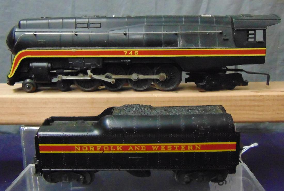 Lionel 746 N&W Long Stripe J: Here is a fairly clean 4-8-4 Northern steam loco with matching 746W tender with long stripe. They show light runtime and light to moderate playwear.