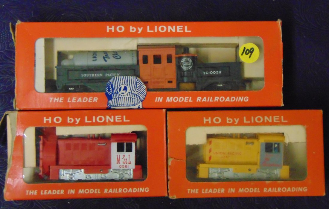 3 Boxed Lionel HO Motorized Units: Includes an 0561 M&StL Snow Plow & 0057 UP Husky Diesel, both obs missing end flaps 1 side; 0039 Motorized Track cleaner, with bottle & wipes, ob has taped flap. Train show light use. Car From The Est