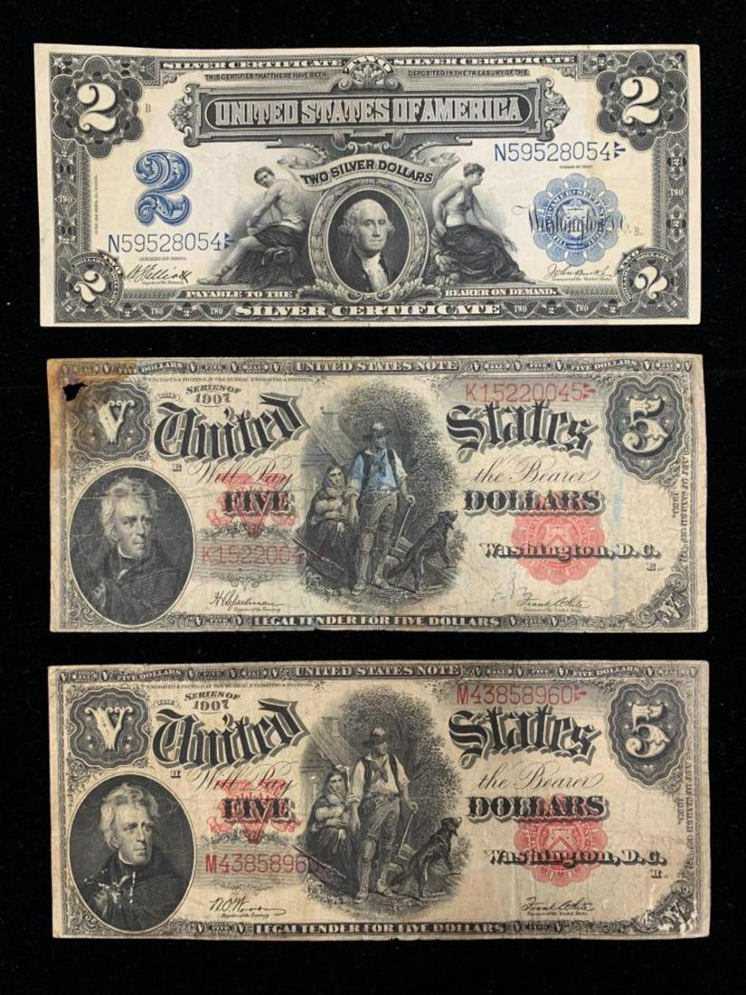 United States Currency Lot of Three.: Includes High Grade $2 Silver Certificate 1899 and Two 1907 Series $5 Notes. Great Lot.