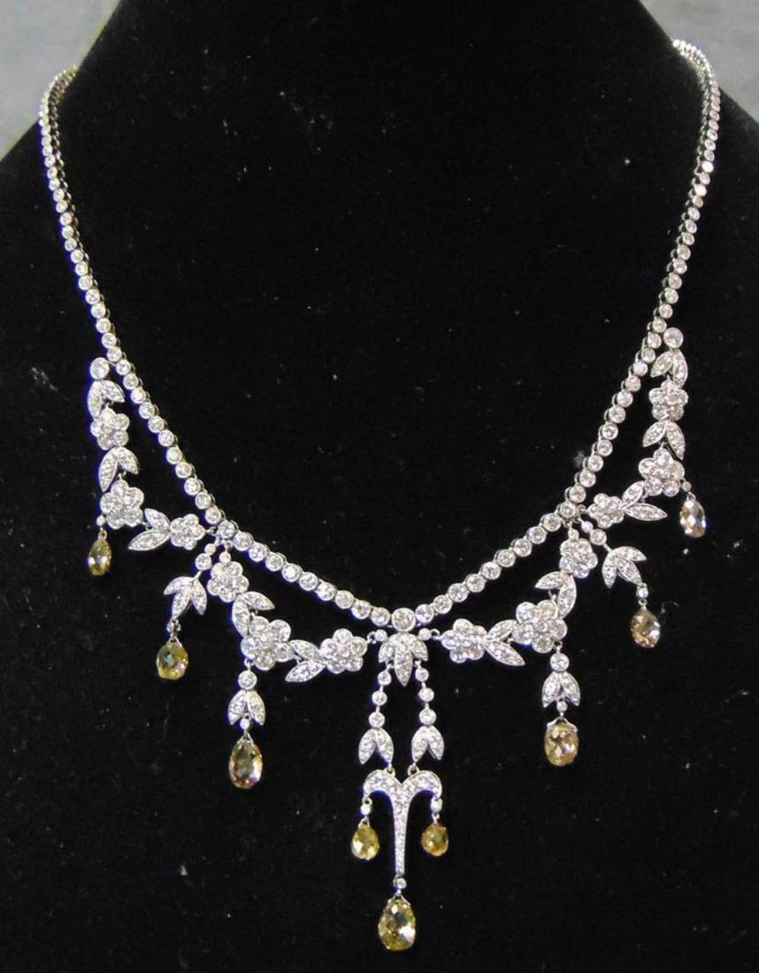 Vintage Platinum Edwardian Diamond Necklace.: Fabulous piece done with briolette fancy color drop diamonds. Constructed of Platinum with a total of one hundred fifty eight (158) round brilliant cut diamonds on the line bezel set, ranging from 0.0