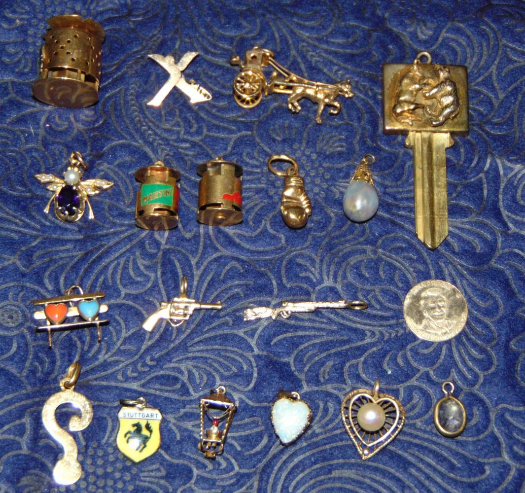 14 K Charms Lot.: (18) Items. Approx. total weight 62 grams. See Photo of Detailed Inventory. This lot is being offered by the Public Administrator of New York County from the Estate of Celeste Martin (190014-101)