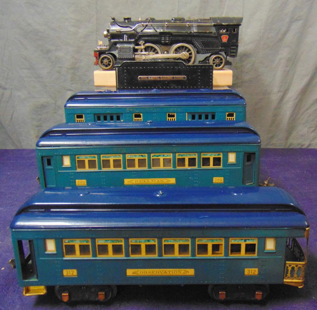 Clean Lionel 1835E Set (366W): ST Gauge, Circa 1934. Includes a 385E steam loco, mixed trim with good castings, just minor pimpeling; 1835W Cast whistling tender with nice castings too. They show light to moderate playwear; 310 Bag