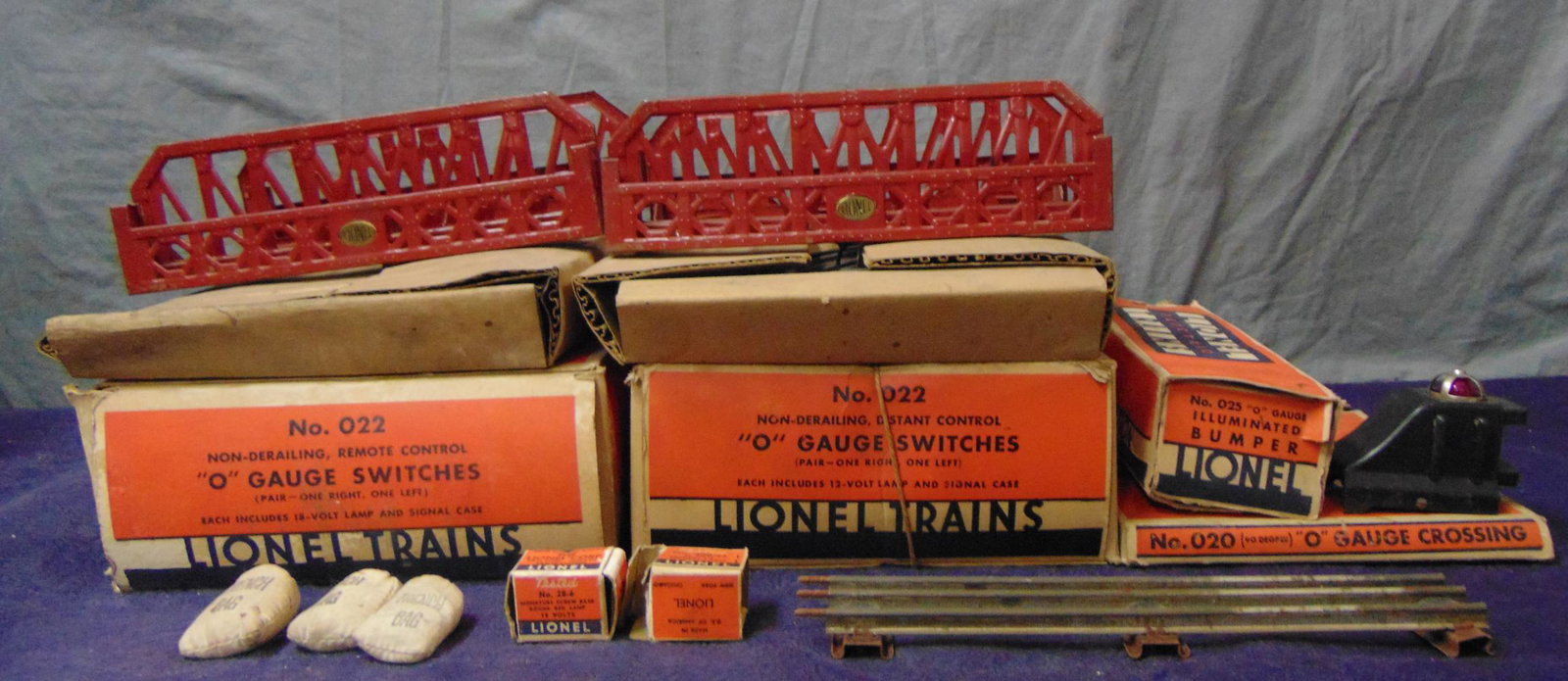 Lionel Track & Accessories: Includes 3 pr 022 switches, 2 have outer boxes, need a cleaning and wire; 2 #270 Bridges; 025 Bumper with rough ob; 020 cross track, ob.