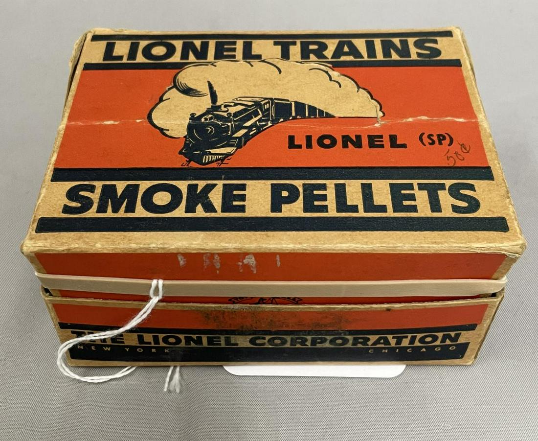 Clean Lionel Dealer SP Smoke Pellet Display: Circa 1952 with American Toys logo, all bottles appear full and have matching full- lines on caps. Display box shows light use with top crease. From The Estate Collection of Neil Padron.