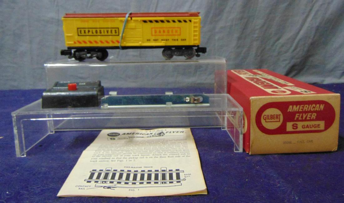 Boxed American Flyer 25061 TNT Car: S Gauge. Nice example, clean and just missing 1 inner cross bar. It has its Instructions, wrapping, Button and activator with a Nice box. Shows light playwear. From the Frank Pisani Collection.