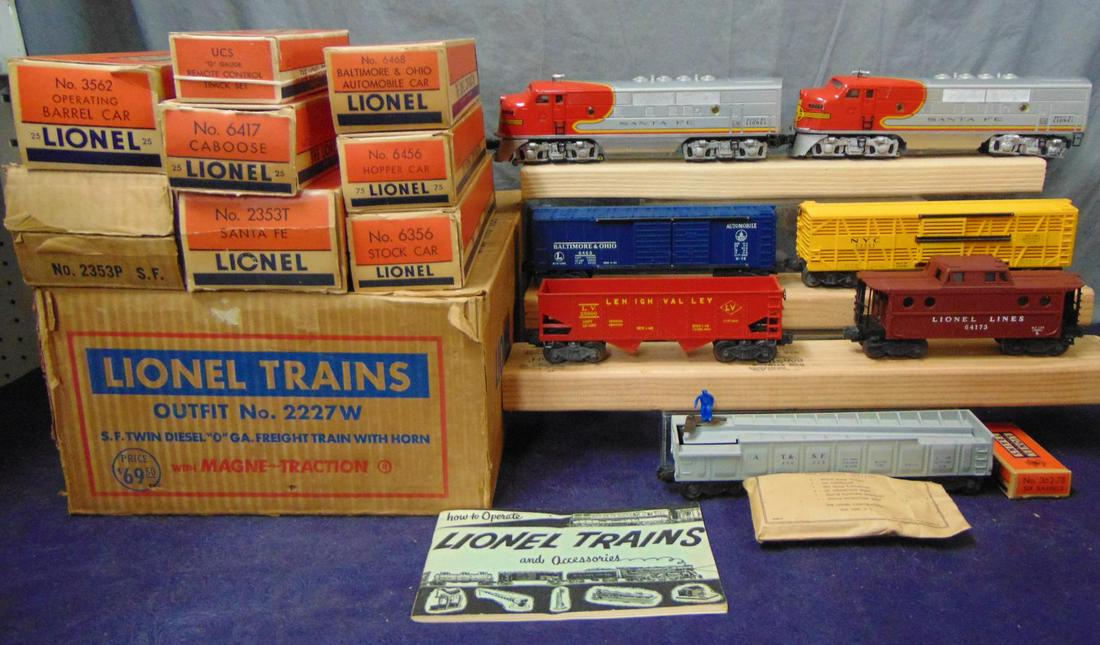 Nice Boxed Lionel F3 Set 2227W: 1954. Includes a super 2353 SF F3 AA Diesels. Beautiful bright silver, nice decals, clean battery box, matched pair; 6456-75 gloss red hopper; 6468 B&O Boxcar; 6456 NYC Stock Car, h/s version; 3562-25
