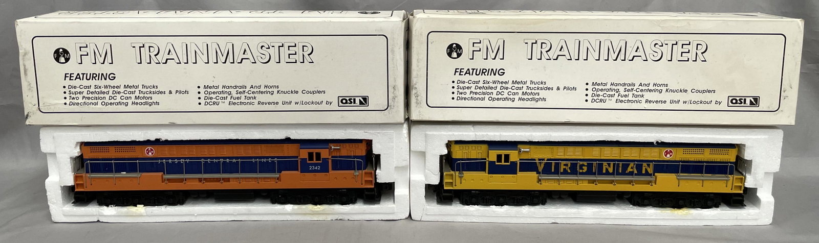2 Custom FM Trainmaster Diesels: Nice dual Motor FM diesels, custom painted in Virginian & Jersey Central. They show light runtime with boxes