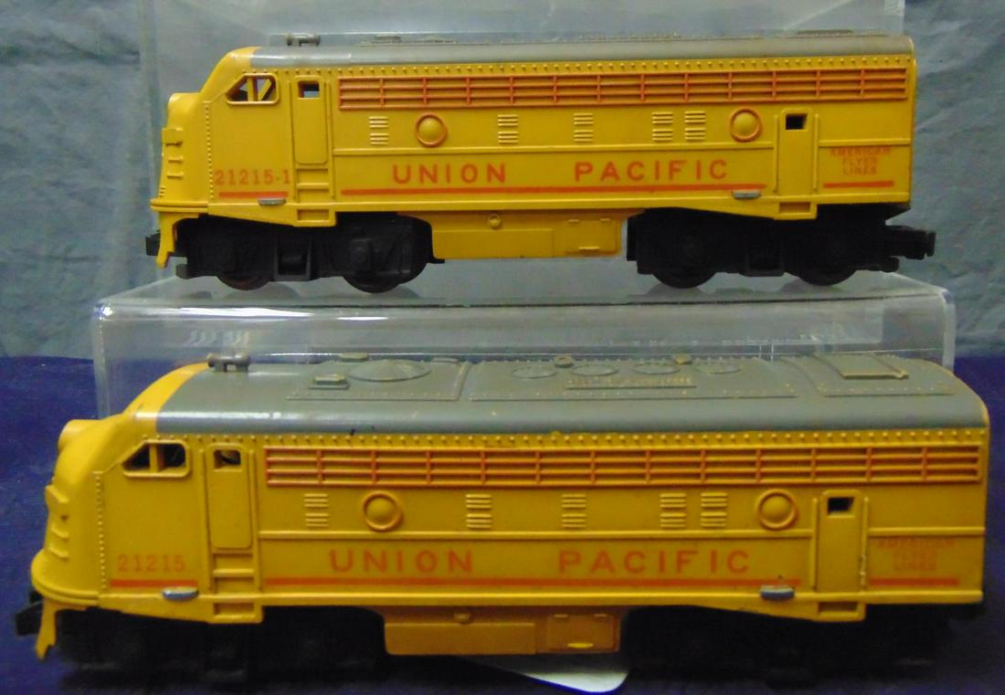 America Flyer 21215 & -1 UP F9 AA Diesels: S Gauge. Matched pair with nice lettering and NO cracks. They are missing the nose stickers and would benefit from a cleaning, but only show light playwear. From the Frank Pisani Collection.