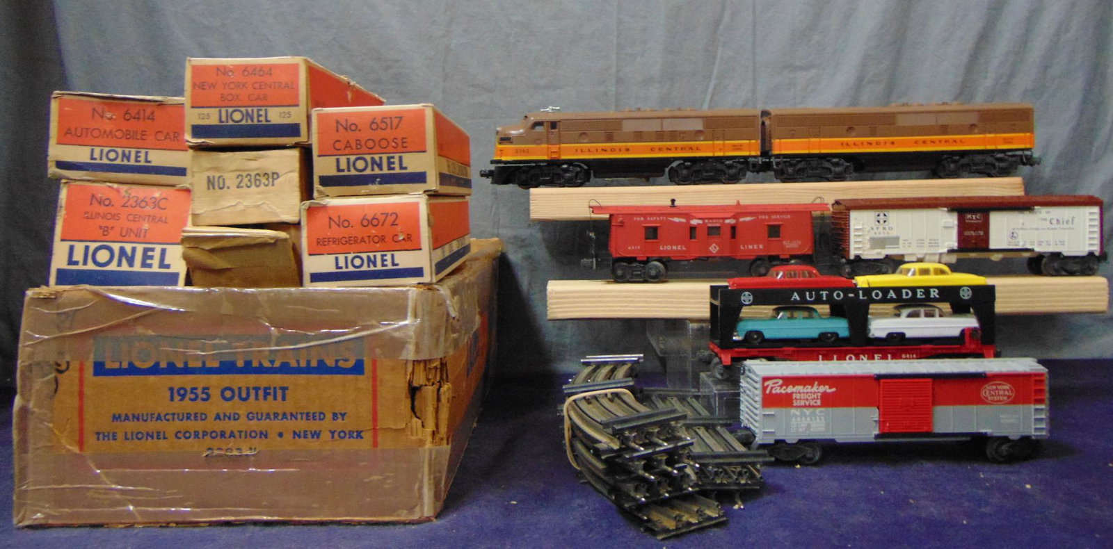 Clean Boxed Lionel 2363 F3 Set 2239W: 1955. Includes a beautiful 2363 IC F3 AB Diesels. Clean even lettering, nice satin patia with clean battery box; 6672 black lettered Reefer; 6414 Auto Ladder, turquoise and red cars each have 1 broken