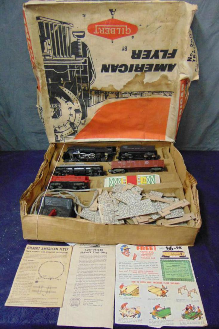 Boxed American Flyer Set 20175: S Gauge. Circa 1958. Includes a 21160 Reading Atlantic; 24325 Gulf Tank car; 24110 PRR Gondola; 24630 Caboose. They show light playwear. Also includes partial cardboard trestle set(748), Transformer d