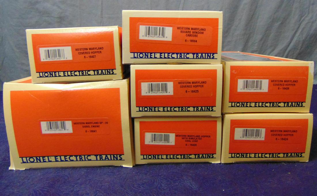 7pc Lionel WM Coal Train: Includes 18841 WM GP20 diesel, missing top box insert; 16420, 16424, 16425, 16426; 16427 hoppers; 16564 WM Caboose. All show light runtime with boxes.