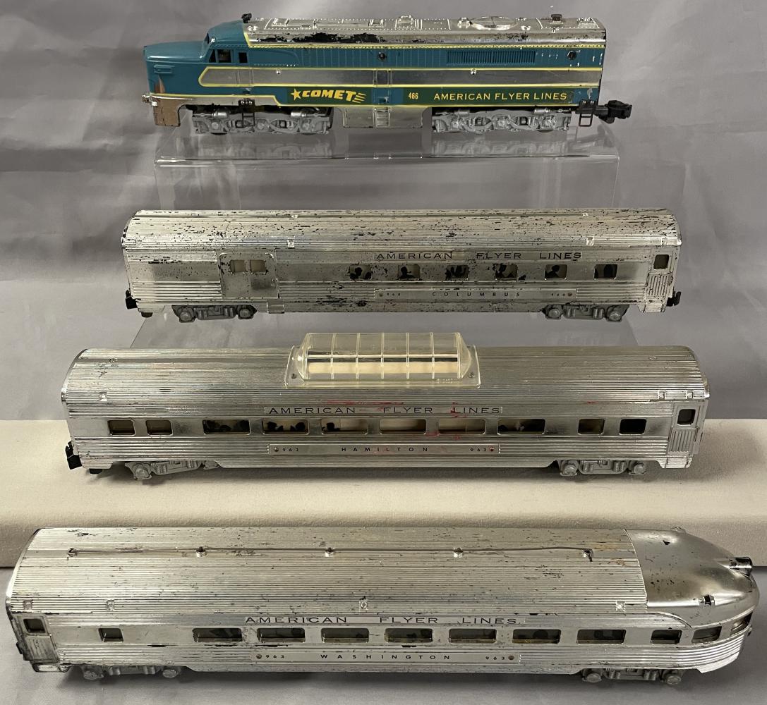 American Flyer Comet Set (K5334T): S Gauge. 1952. Includes a 466 Comet PA Alco A Diesel, horns incomplete; 960 Combine; 962 Vista-Dome; 963 Observation. All in Chrome finish, showing moderate playwear.