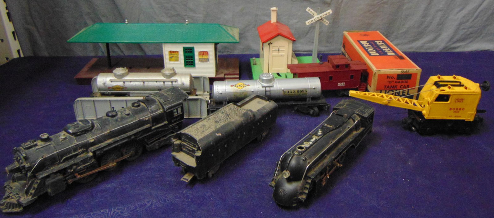 Misc Lionel Lot: Includes 2046, 2046W(1950); 221; 3360, test run, but boom is broken; 6465; 6555 with box; 250T; Prewar 45N; 256; 314. Most have issues or very dirty. SOLD AS-IS.
