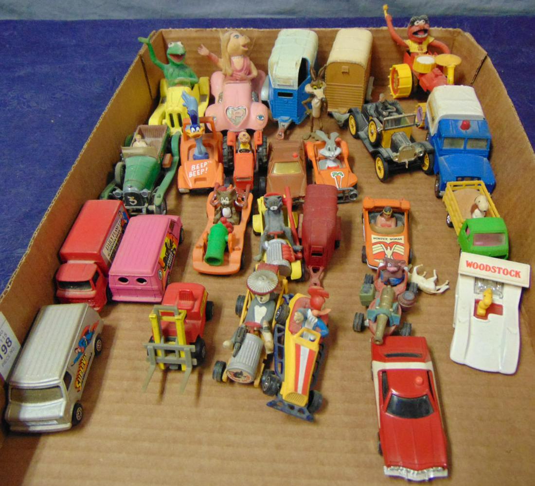 Large Lot of Corgi Vehicles: Includes many Corgi Jr Character cars with others. All would benefit from a good cleaning and show light playwear over-all.