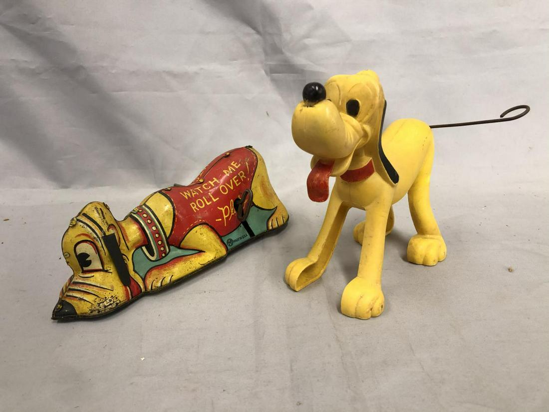 2 Marx Disney Pluto Toys: Includes an early Roll-Over Pluto with original ears, mechanism rolls, no tail action; Plastic dancing pluto, functional. They show light to moderate playwear.