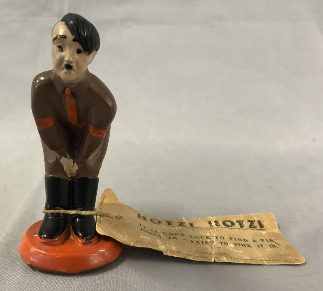 World War Two Hitler Pin Cushion.: 4 1/2" tall Chalk painted figure of Hitler with a pin cushion behind.