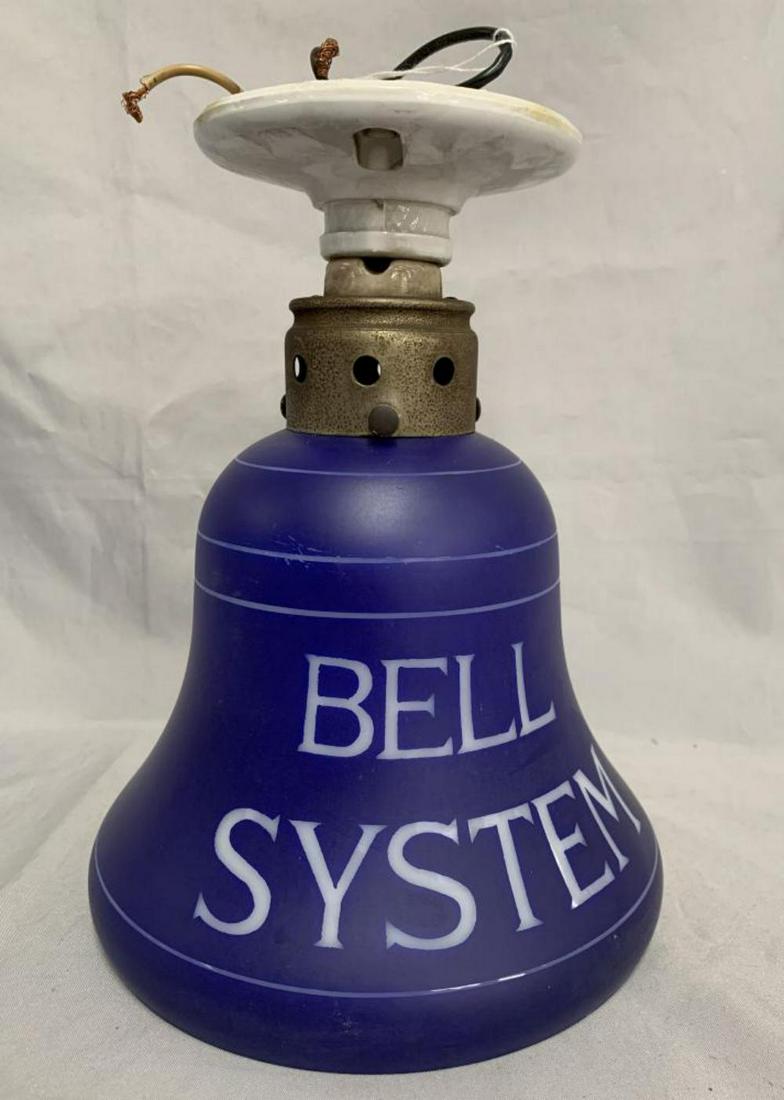 Bell Telephone Light Fixture.: Early Cobalt Blue Telephone Dome Fixture. Beautiful piece with one chip out of edge in between the writing on a side area. Does not detract from the great look of this piece. Overall approx. 9-3/4" ta