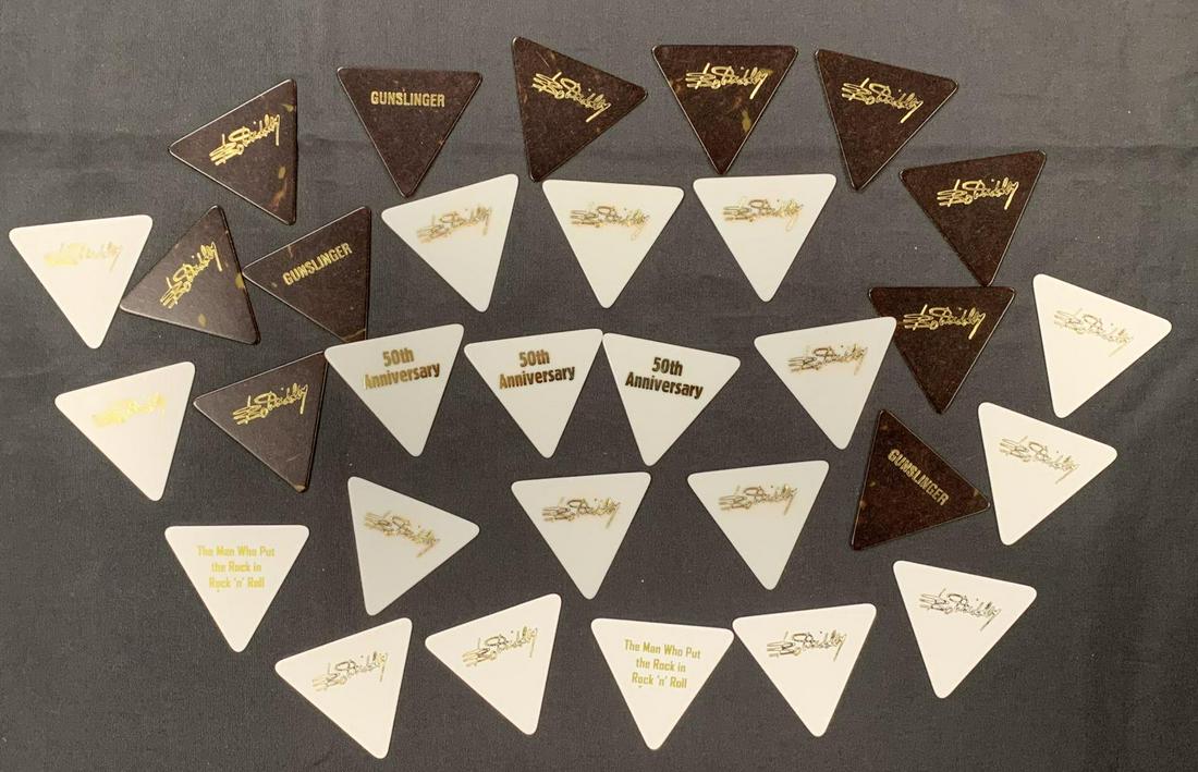(30) Bo Diddley Guitar Picks: (30) Bo Diddley Guitar Picks, 2" triangular shape, mint unused, each has Bo Diddley's facsimlie signature printed on one side, (10) "Gunslinger" 1988 tour with Ron Wood of the Rolling Stones, (10) "50
