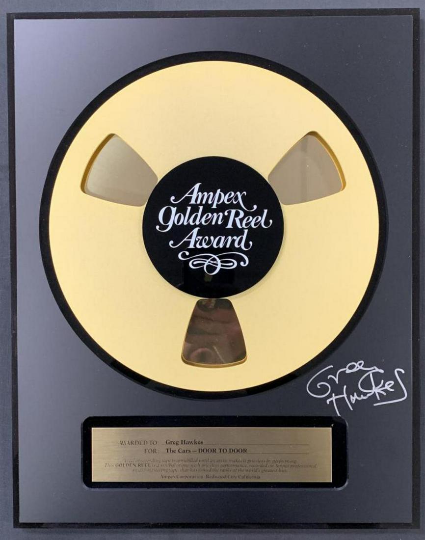 Greg Hawkes of The Cars Signed Ampex Award: Greg Hawkes of The Cars Autographed Ampex Golden Reel Award, "Awarded to Greg Hawkes for The Cars - Door To Door," signed by Greg in person, 13.5" x 17," wood base.