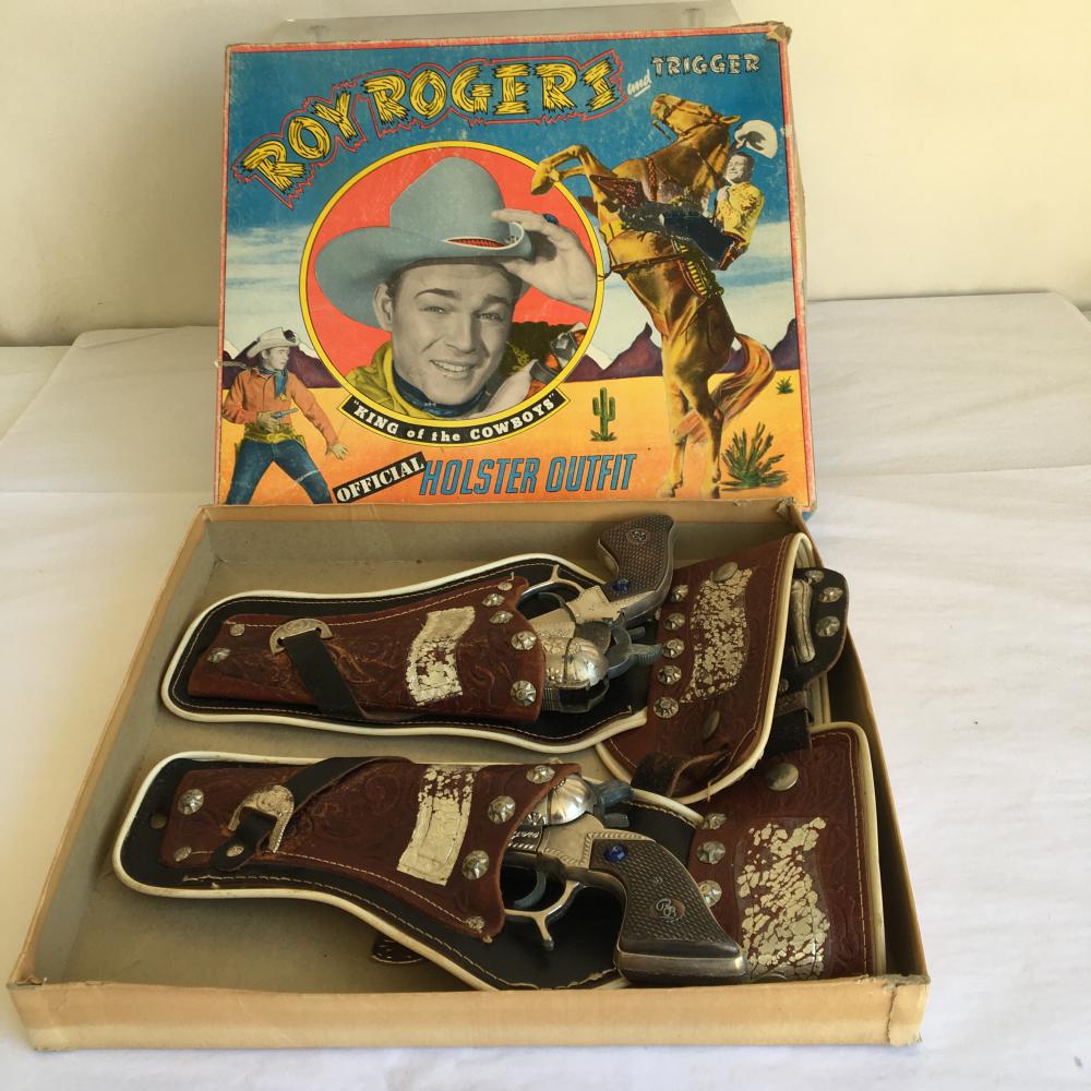 Roy Rogers Gun and Holster Set Boxed.: Classy Products. Silver Paint on Holster flaking, grips have "Blue Jewel" inset.