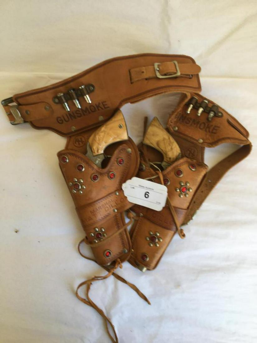 Gunsmoke Cap Gun and Holster Set.: Leather Holster engraved Marshall Matt Dillon, Grips with raised Horse Heads.