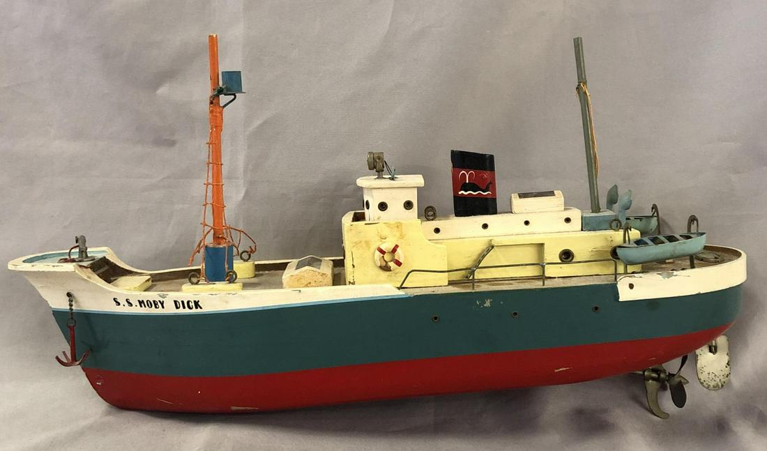 ITO, Japan SS MOBY DICK Whaler: Painted wood with metal trim, 15” long. Battery operated, not functional at time of test, though appears complete, with broken rigging hook & anchor on 1 side. It has minor corrosion on metal parts