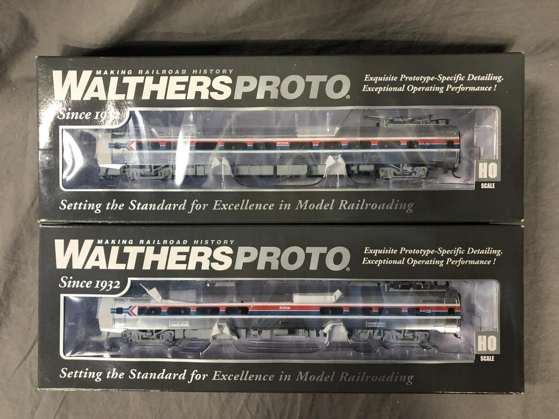 2 Boxed Walthers HO Amtrak Budd Metroliners: Includes 920-14800 Phase I Snack Bar coach(861); 920-14841 Coach (823). They are powered and equipped with Tsnumai Sounds and DCC. They appear new in boxes.