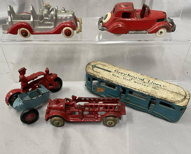 5 Vintage Cast Iron Vehicles: Includes a 6 1/2” Arcade Greyhound NY Worlds Fair tram, decals 50%; Hubley Cop Motorcycle with side car; Hubley Town Car, grill incomplete, replaced tires; Hubley silver Fire Ladder truck, missing l