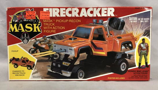 1986 MISB MASK Firecracker Vehicle, Kenner: Mint in Sealed Box. Kenner MASK Vehicle, "Firecracker" with Hondo Maclean figure. Box is factory taped on each end. Front of box has 2 price stickers affixed. Box shows some edge and corner wear with