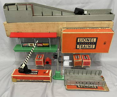 7 Lionel Accessories, Most Boxed: Includes a 364 Lumber loader with 364C only, ob; 156 Station Platform, insert, ob missing flaps one side; 3 #260 Bumpers, abs; 252 Crossing gate, worn ob; play worn 153 & 314. Rest show light 