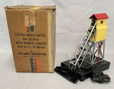 LN Boxed Lionel 97 Coal Eleveator: Super clean & shiny with controller. Its shows test run use at best and has all inserts and worn master box. Nice example.