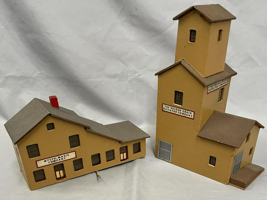 Clean American Flyer 162 & 165 Wood Buildings: S Gauge. Made for AF by Mini-Craft during Korean War. Includes a 162 Mysto Magic Factory showing light handling; 165 Grain elevator with light crazing and light playwear.