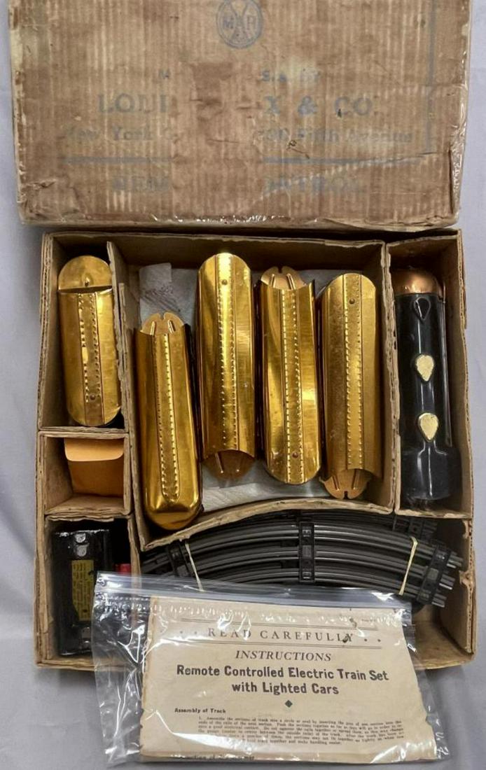 Boxed Marx 7096 Copper Mercury Set: Includes a NYC Mercury Loco; Tender; Mail Car; Illuminates cars- Chicago Coach; Toledo Coach; Detroit Obsv, copper is bright w/minimal scratches. Track, Transformer, insert. osb w/inserts worn, top ta