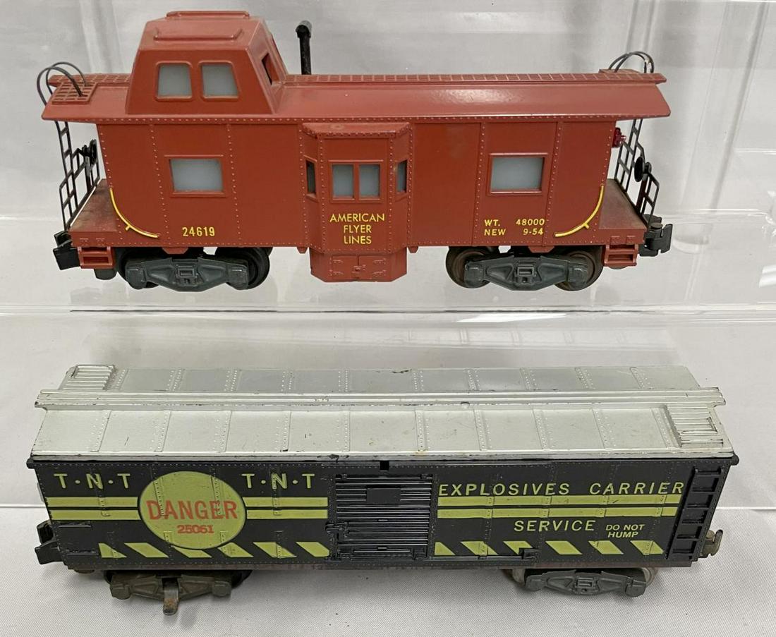 American Flyer 25061 & 24619 Freight Cars: S Gauge. Includes a nice 24619 Bay Window Caboose, missing screw; 25061 TNT Car, intact, showing moderate playwear. From The Collection Of Frank Pisani