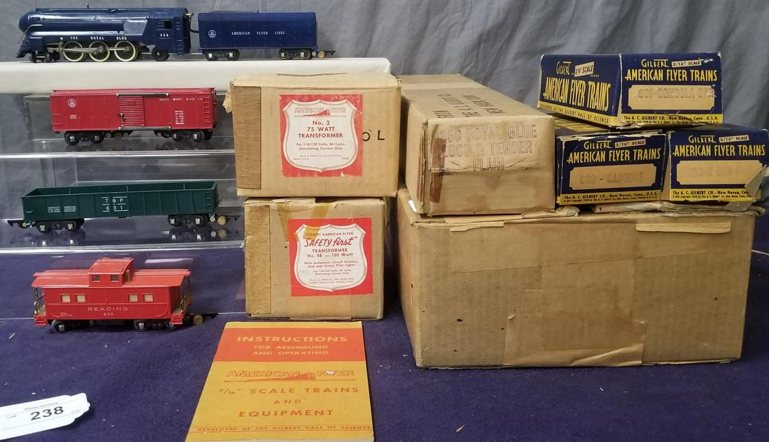 Boxed American Flyer Royal Blue Set 48-T: S Gauge. Includes a 350 The Royal Blue streamline loco, early version with handrails; 633 B&O boxcar; 631 T&P gondola; 630 Lighted Caboose. All show light run time with wrap, boxes, some peripherals,