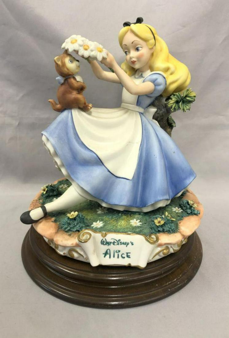 Disney, Alice in Wonderland, Capodimonte Sculpture: Offered is a Capodimonte porcelain sculpture of Walt Disney's Alice from "Alice in Wonderland", stamped by artist Enzo Arzenton and produced for the Laurenz Collection, made in Italy. Limited edition.