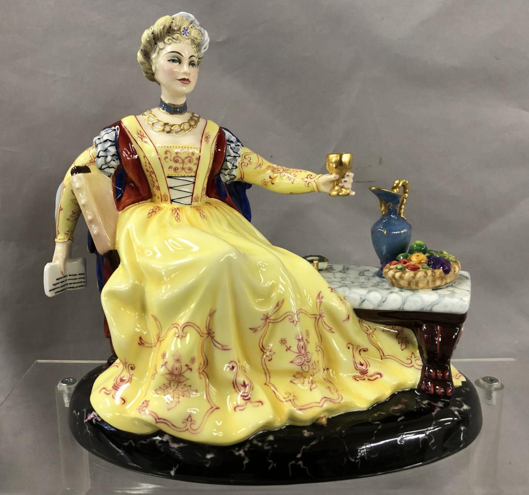 Lucrezia Borgia HN2342 - Royal Doulton Figurine.: Limited Edition #79 of 750. Part of the Les Femmes Fatales Series. Limited edition tribute figurine to Renaissance beauty, daughter of Pope Alexander VI. She is wearing a bright yellow royal dress hol