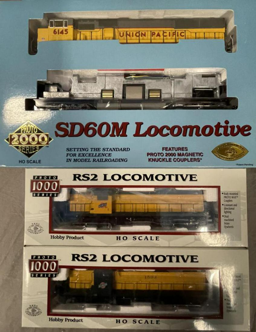 3 Life-Like Proto 1000 and 2000 Diesels: Includes a 30163 UP SD60M #6145; 920-53114 CNW RS2 #1503; 920-53113 CNW RS2 #53. All appear new in boxes.
