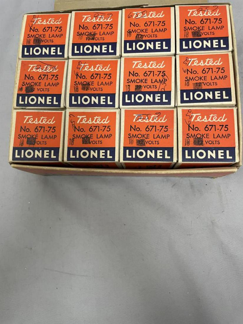 Dealer Display Box 671-75 18 Watt Smoke Bulbs: Contains 12 mint boxed bulbs, all over-stamped 18 volts; master box is 703-10 blacked out. Nice set!
