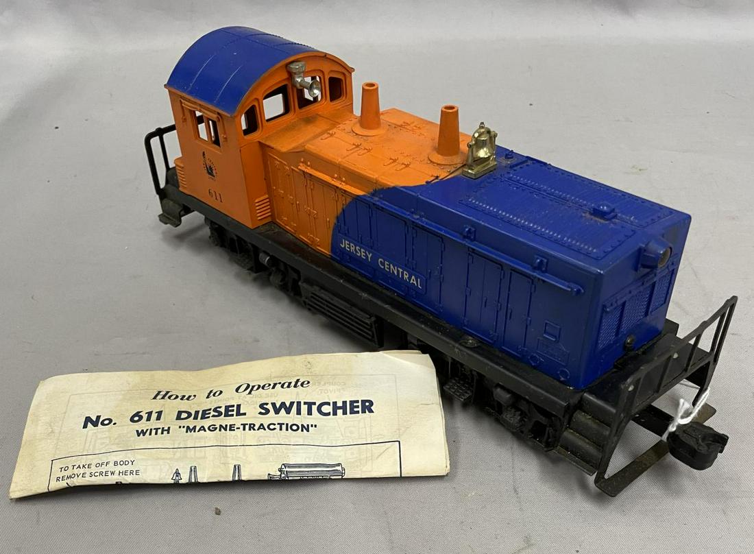 Clean Lionel 611 JC NW2 Diesel: Nice example with hairline screw crack. It includes itâ€™s scarce instruction sheet and shows light playwear.