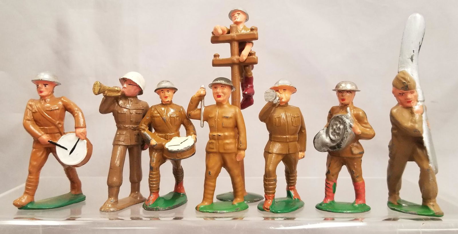 Lot of  (8) Dime Store Military Pieces. (1 of 7)